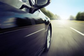 Blurred road and car, speed motion